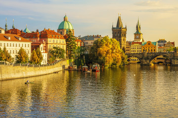 Obraz premium Charles Bridge and architecture of the old town in Prague, Czech republic. Evening sunset in the old town of Prague.