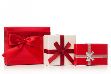 Red and white gift boxes on white background