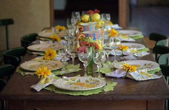 Table decorated with colorful crockery