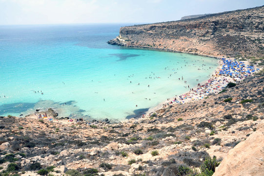 Lampedusa, Italy - August/25/2010 : Tourists In Rabbit Island Beach