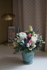 A small beautiful bouquet of wound flowers