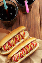 Hot dogs on wooden background