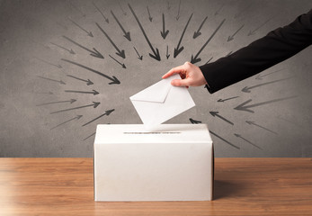 close up of a ballot box and casting vote on grungy background