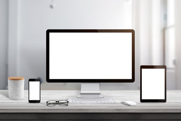 Isolated computer, tablet and smart phone display scene for responsive design promotion.