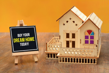 Buy your dream home today banner with 3D house miniature