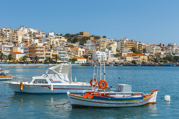 Seaport of Sitia town with moored traditional Greek fishing boat