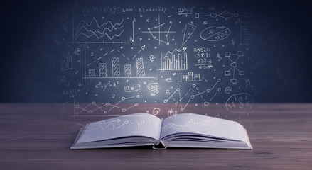 Hand-drawn financial plans and charts coming out of an open book 