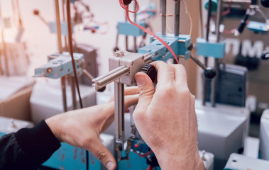 Electrician worker checking electricity meters. Electrical equipment.