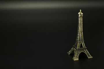 Eiffel tower isolated on black background.
