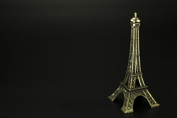Eiffel tower isolated on black background.