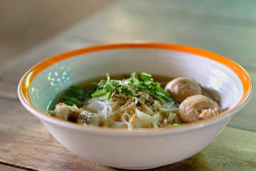 Noodle and soup in bowl put on the table