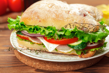 sandwich on a wooden table