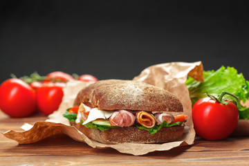 sandwich on a wooden table