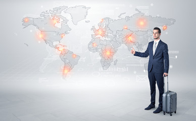 Businessman in dark suit hitchhike to business trip in a front of a map with destination
