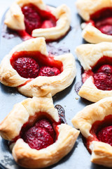 Freshly baked strawberry puff pastry by homemade kitchen. in a baking dish