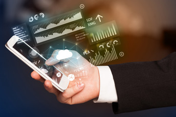 Hand using phone with cloud technology and linked information concept