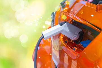 Green power EV Car or Electric car battery charging  Eco friendly vehicle energy concept