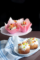 Easter bread with white icing, candied fruits and nuts