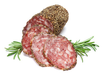 Dried organic salami sausage covered with pepper on white background