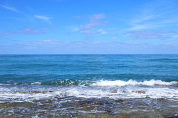 background of beach and sea with blue summer sky.