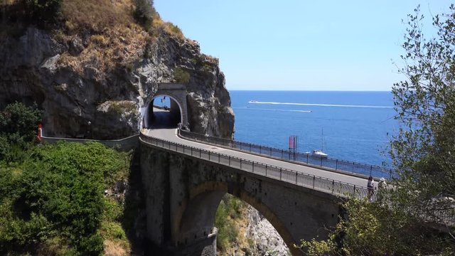 famous picturesque road viaduct over sea of Amalfi coast, Italy