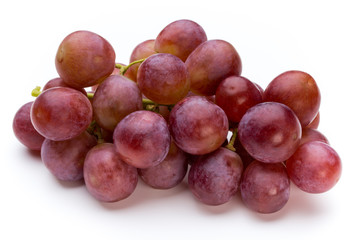 Ripe red grape isolated on white.