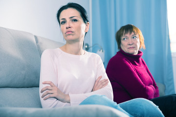 Portrait upset adult women looking away after conflict