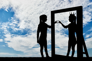 Silhouette of a narcissistic woman with a crown on her head and a hand gesture of the heart in...