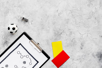 Sport judging concept. Soccer referee. Tactic plan for game, football ball, red and yellow cards,...