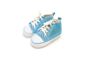 Blue sneakers for the kid on a white background. Isolated objects