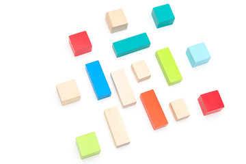 Multicolored wooden cubes on a white background. Developing toys