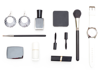 Female cosmetics and accessories are black and white on a white background. Geometric