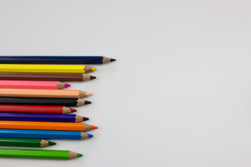 Pencils on white background. Free space for designers