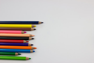 Pencils on white background. Free space for designers