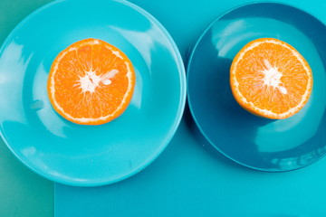 Orange and plates. Summer food concept. Fresh fruits