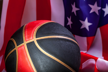 basketball with an American flag in the background