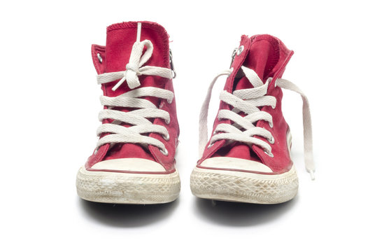 Red sneakers isolated on a white background