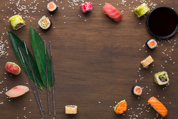 Obraz na płótnie Canvas Asian food frame on wooden background