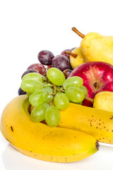 Many different fruits on white background