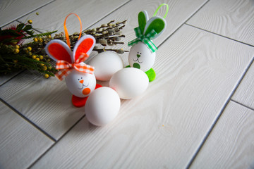 Easter eggs on wooden background. Happy Easter. Creative photo with easter eggs