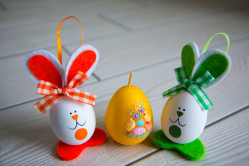 Easter eggs on wooden background. Happy Easter. Creative photo with easter eggsEaster eggs on wooden background. Happy Easter. Creative photo with easter eggs