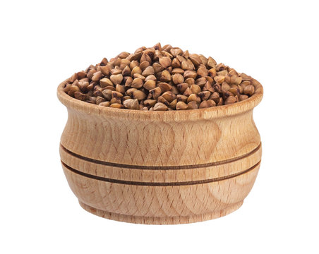 Buckwheat grain isolated on white background with clipping path. Closeup
