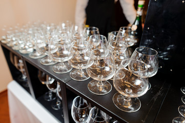 Set of empty and elegant wine glasses on the table