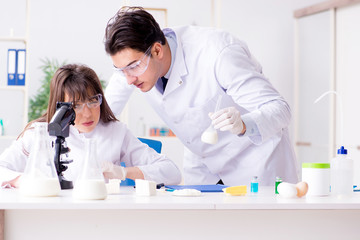 Two lab doctor testing food products