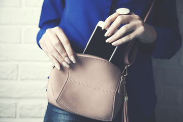 Woman hand  fashion bag and ring