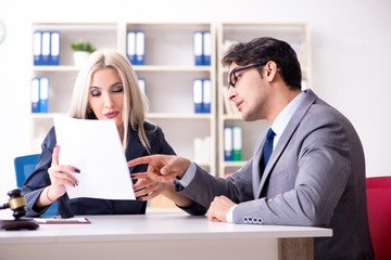 Lawyer discussing legal case with client