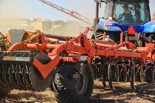 Details of a modern combine harvester close-up. modern combine harvester works in the field. Sowing and harvesting.