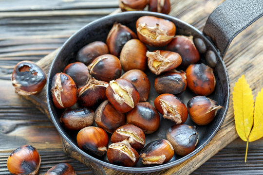 Roast Chestnuts In A Pan Closeup.