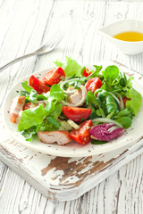 Fresh vegetables and chicken salad