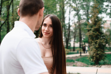 Young beautiful couple walking outdoor